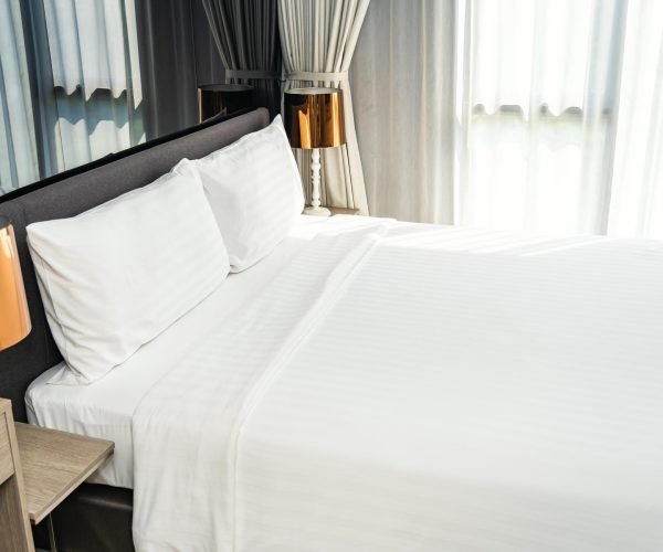 White pillow on bed decoration interior of room